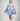 Girl in royal blue taffeta dress with sequin lace front and velvet bow accents.