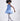 Girl in azure sequin lace dress with dramatic flared tulle hem.