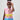 Girl in linen taffeta dress with Atlantis-themed print and white hem.