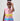 Girl in linen taffeta dress with Atlantis-themed print and white hem.