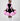 Girl in black velvet dress with pink organza ruffles and voluminous skirt.