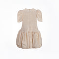 Champagne gold girls party dress with gathered skirt and puff sleeves—back view of Amber Dress.