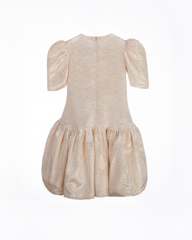 Champagne gold girls party dress with gathered skirt and puff sleeves—back view of Amber Dress.