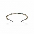 Jeweled headband with multicolored stones on a white background