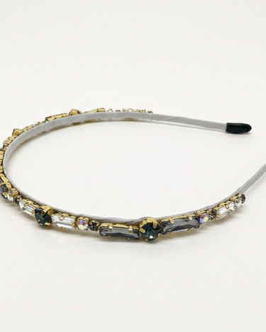 Decorative headband with gemstones on a white background