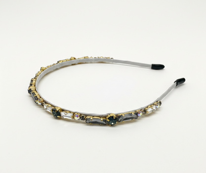 Decorative headband with gemstones on a white background
