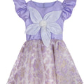 Lilac high-low occasion dress with petal-shaped white flower and floral brocade skirt – Bloomlight Dress for girls aged 5–14.