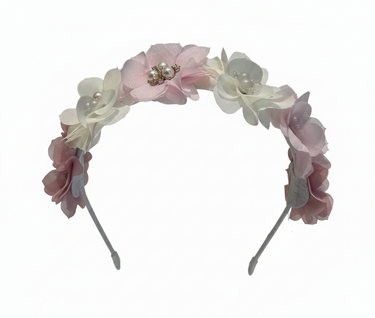 Floral headband with pink and white flowers on a white background