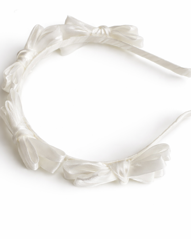 White satin knot headband for girls with sculpted knot detailing