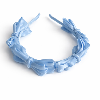 Blue satin knot headband for girls with sculpted knot detailing