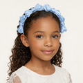 Blue satin knot headband for girls with sculpted knot detailing