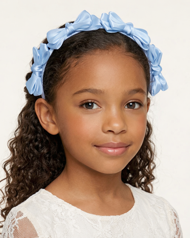 Blue satin knot headband for girls with sculpted knot detailing