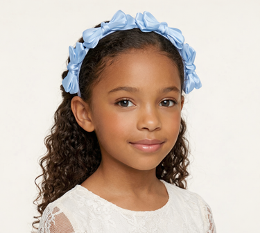 Blue satin knot headband for girls with sculpted knot detailing