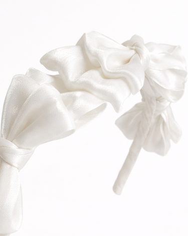 White satin knot headband for girls with sculpted knot detailing