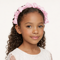 Pink satin knot headband for girls with sculpted knot detailing