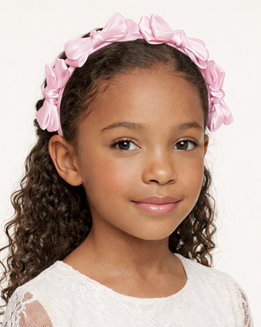 Pink satin knot headband for girls with sculpted knot detailing