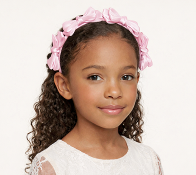Pink satin knot headband for girls with sculpted knot detailing