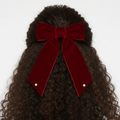 Luxury crimson velvet bow hair clip with pearl accents for girls