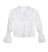 White crinkle blouse for girls with oversized lace-trimmed collar and shirred bell sleeves – Eloise Blouse ages 1–14.