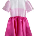 Duchess Dream pink satin dress for girls with pearl puff sleeves and bow detail – perfect for weddings, birthdays, and girls' party outfits ages 1–14.
