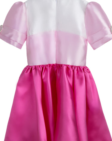 Duchess Dream pink satin dress for girls with pearl puff sleeves and bow detail – perfect for weddings, birthdays, and girls' party outfits ages 1–14.