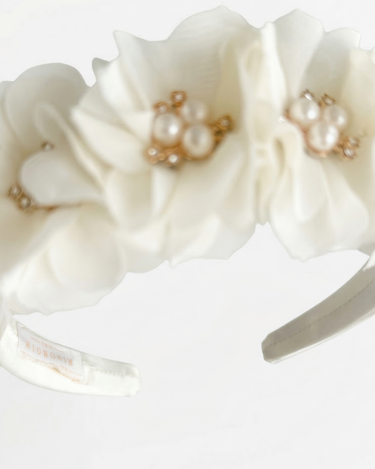 Ivory satin headband with fabric flowers and pearl accents