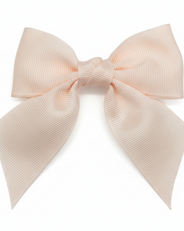 Large pink hair bow on a white background