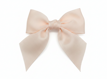 Large pink hair bow on a white background