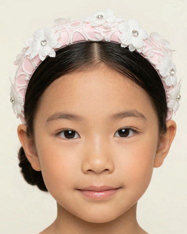 Pink satin headband with guipure lace overlay and crystal-centred floral appliqués for girls aged 2–12 years