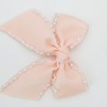 Luxury pearl trim signature bow hair clip for girls