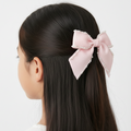 Luxury pearl trim signature bow hair clip for girls