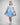 Girl in royal blue taffeta dress with sequin lace front and velvet bow accents.