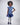 Girl in sequined lace and denim-look taffeta dress with flutter sleeves.