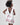 Girl in taffeta A-line dress with flamingo print, tulle sleeves, and back bow.