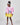 Girl in colour-block crinkle taffeta dress with yellow hem and pink sleeves.