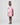 Girl in pink A-line dress with panda print and lace collar.