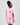 Girl in pink A-line dress with panda print and lace collar.
