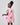 Girl in pink A-line dress with panda print and lace collar.