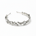 Silver headband with clear gemstones on a white background