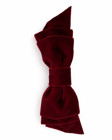Red bow tie on a white background