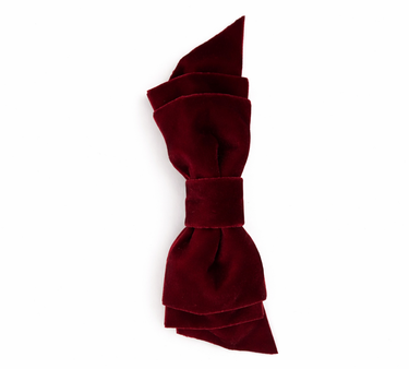 Red bow tie on a white background